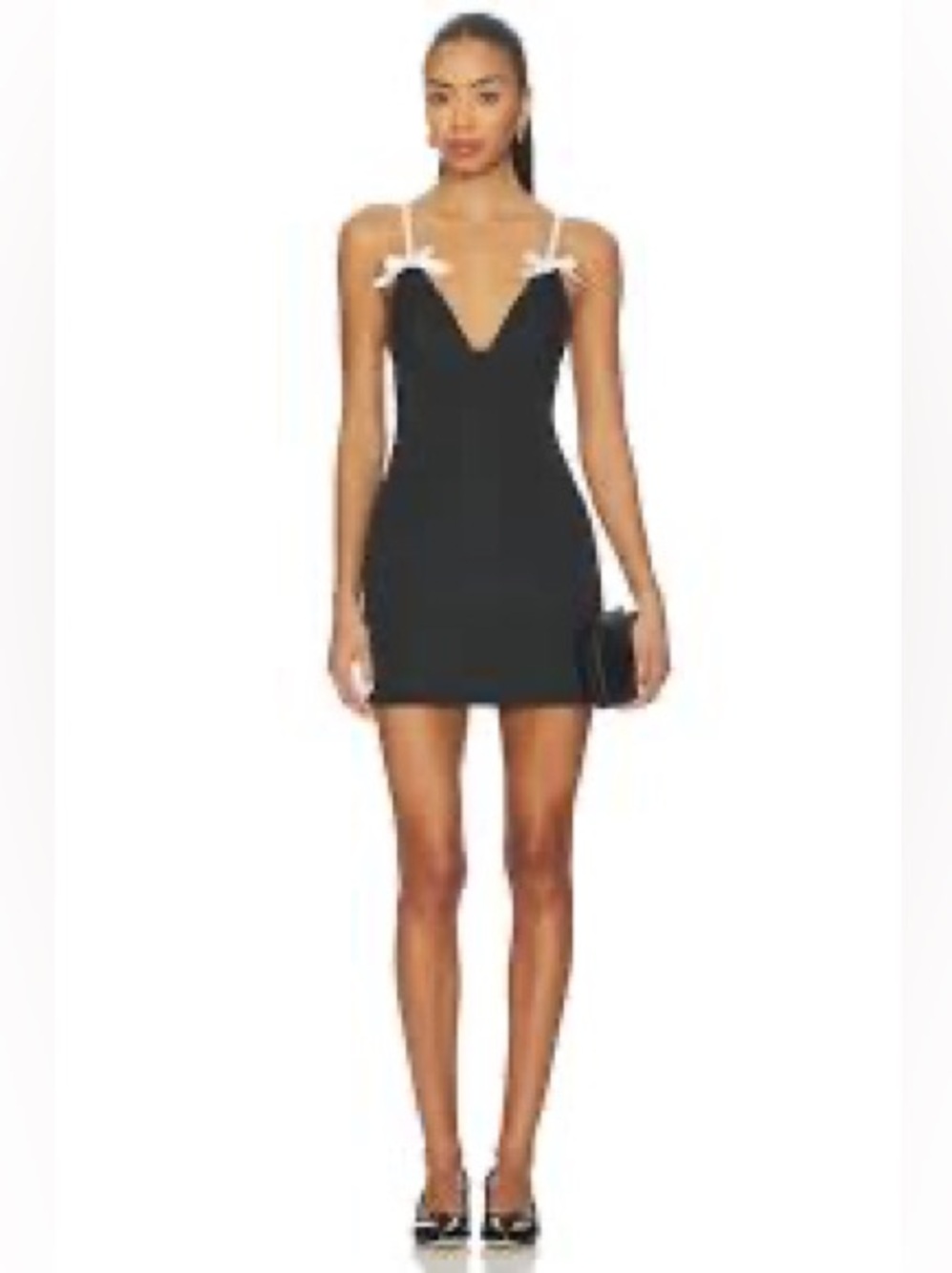 More to Come Delilah black mini dress featuring feminine bow accents